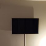 TV wall mounted installation with surface cord concealment