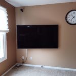 TV wall mounted TV wall mounted installation with surface cord concealment