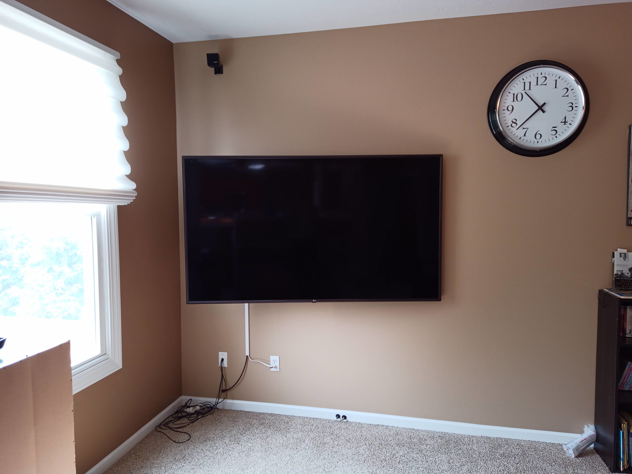 TV wall mounted TV wall mounted installation with surface cord concealment